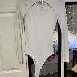 Cute tie front bodysuit. Worn twice!!